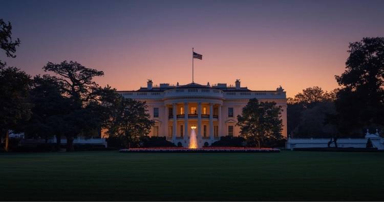 An executive with hand holding a fountain pen over a document called national AI policy framework. A pair of glasses and another pen sit on the desk.