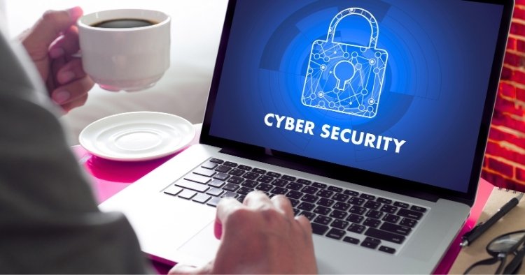 Business owner reviewing cyber insurance policy requirements